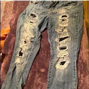 Distressed boyfriend blue jeans
